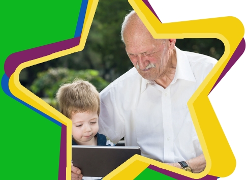 Family Fellowship teaser image: older mand and young boy looking at an Ipad